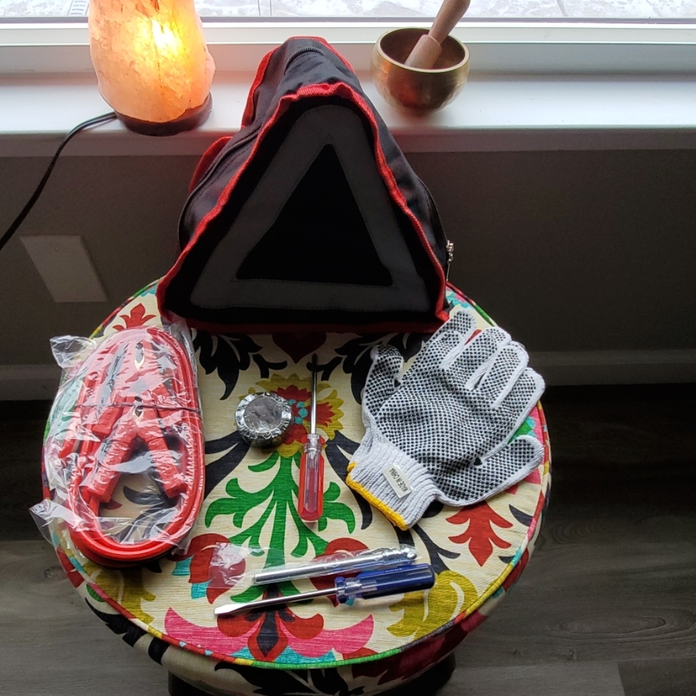 Car kit with cables and other tools.